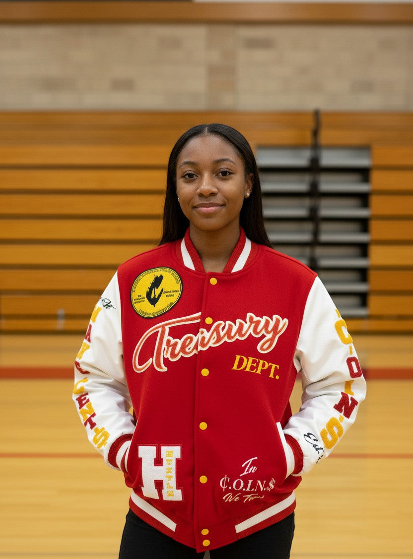 NUMMI VESTES red wool and white leather varsity jacket with embroidered patches worn by a young woman in a gym