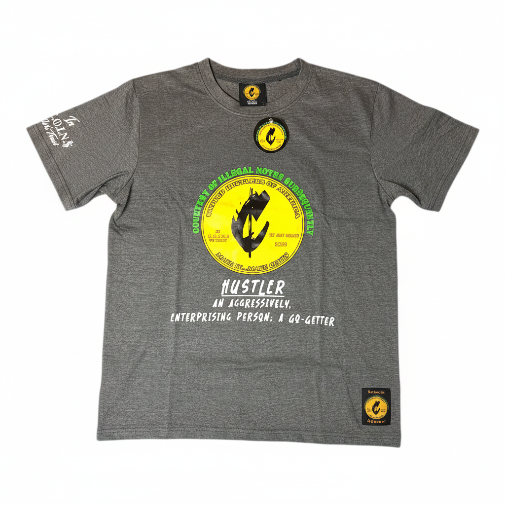 A heather gray graphic t-shirt featuring a yellow and green circular logo on the chest, white text below, and additional graphics on the sleeve and a small patch on the lower hem, set against a plain white background.