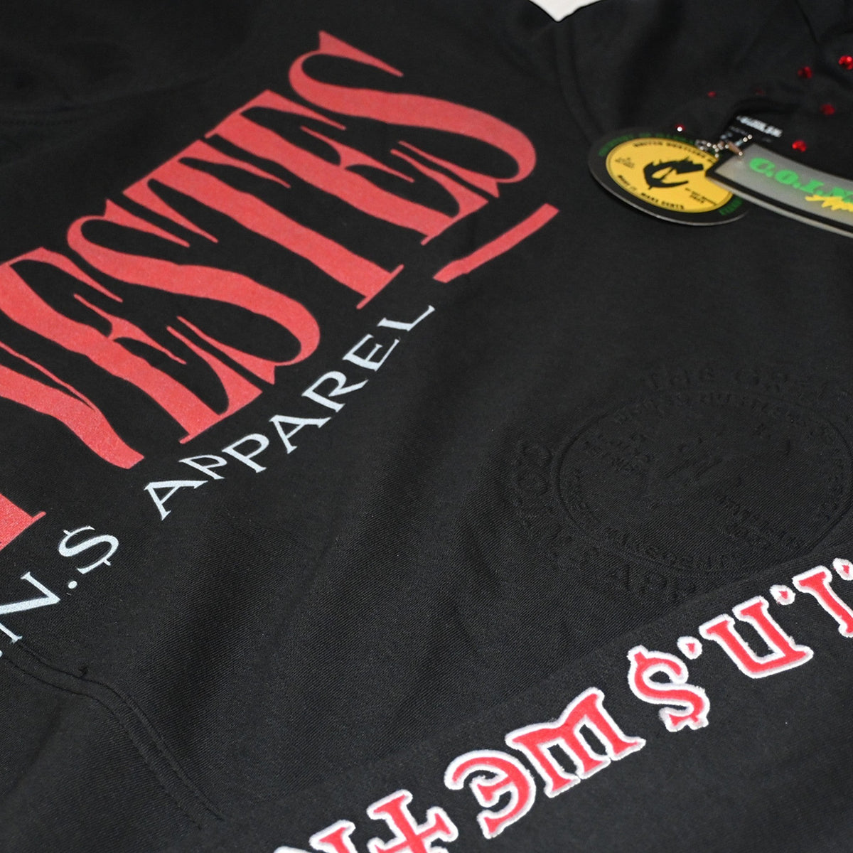 NUMMI VESTES black cotton pullover hoodie with bold red graphic text and subtle embossed chest logo