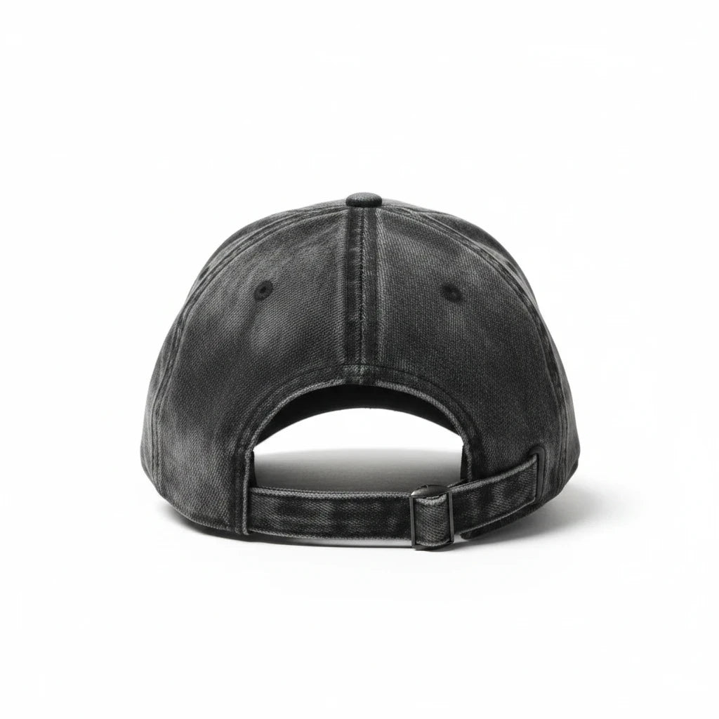 Back view of a NUMMI VESTES acid-washed black denim baseball cap with an adjustable metal strap closure.