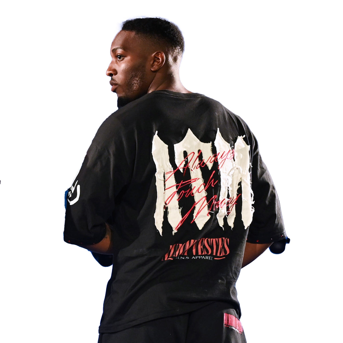NUMMI VESTES black cotton jersey t-shirt with white graphic print and red text on the back worn by a man