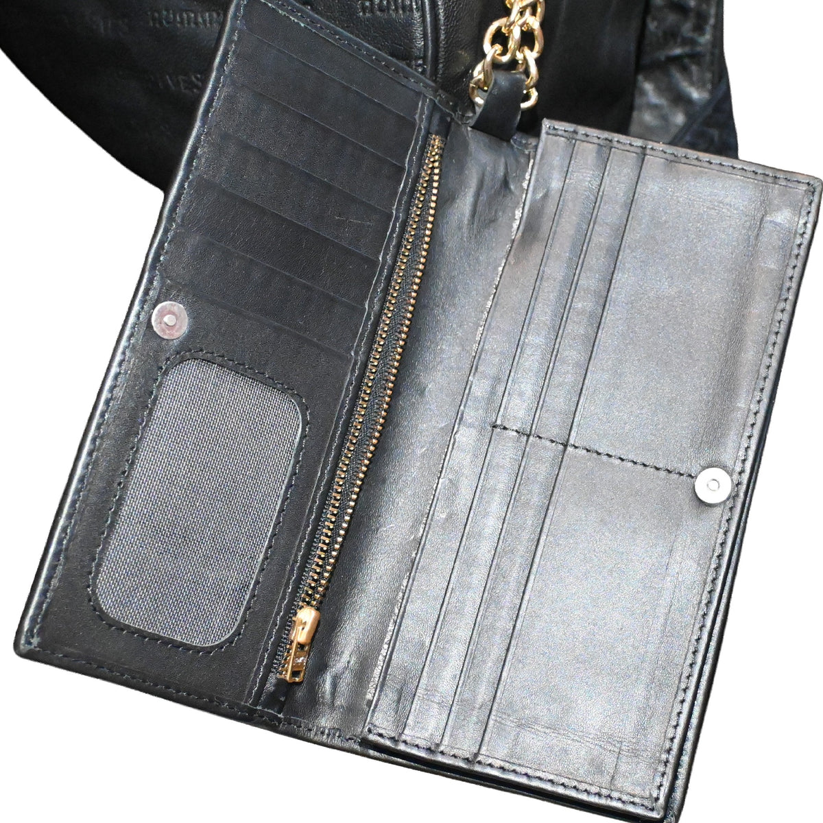 NUMMI VESTES black leather wallet interior with multiple card slots, zipper pocket, and ID window
