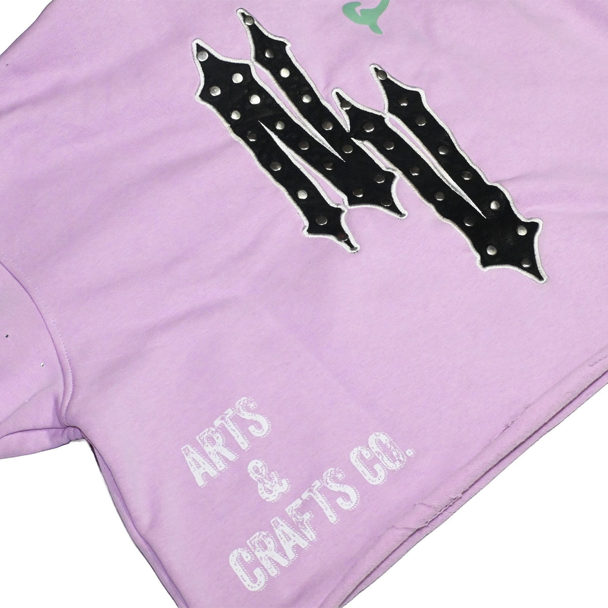 NUMMI VESTES lavender cropped hoodie with black studded graphic logo and white Arts & Crafts Co. text detail