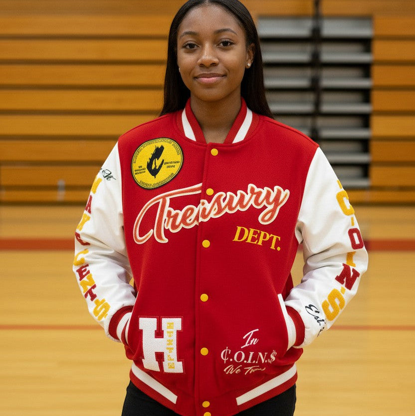 NUMMI VESTES red wool and white leather varsity jacket with embroidered patches worn by a young woman in a gym