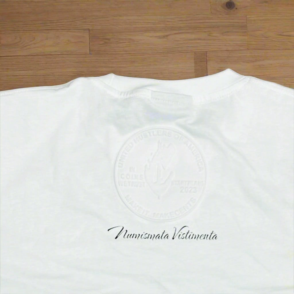 NUMMI VESTES white cotton crewneck t-shirt featuring a subtle embossed emblem and script logo on the back