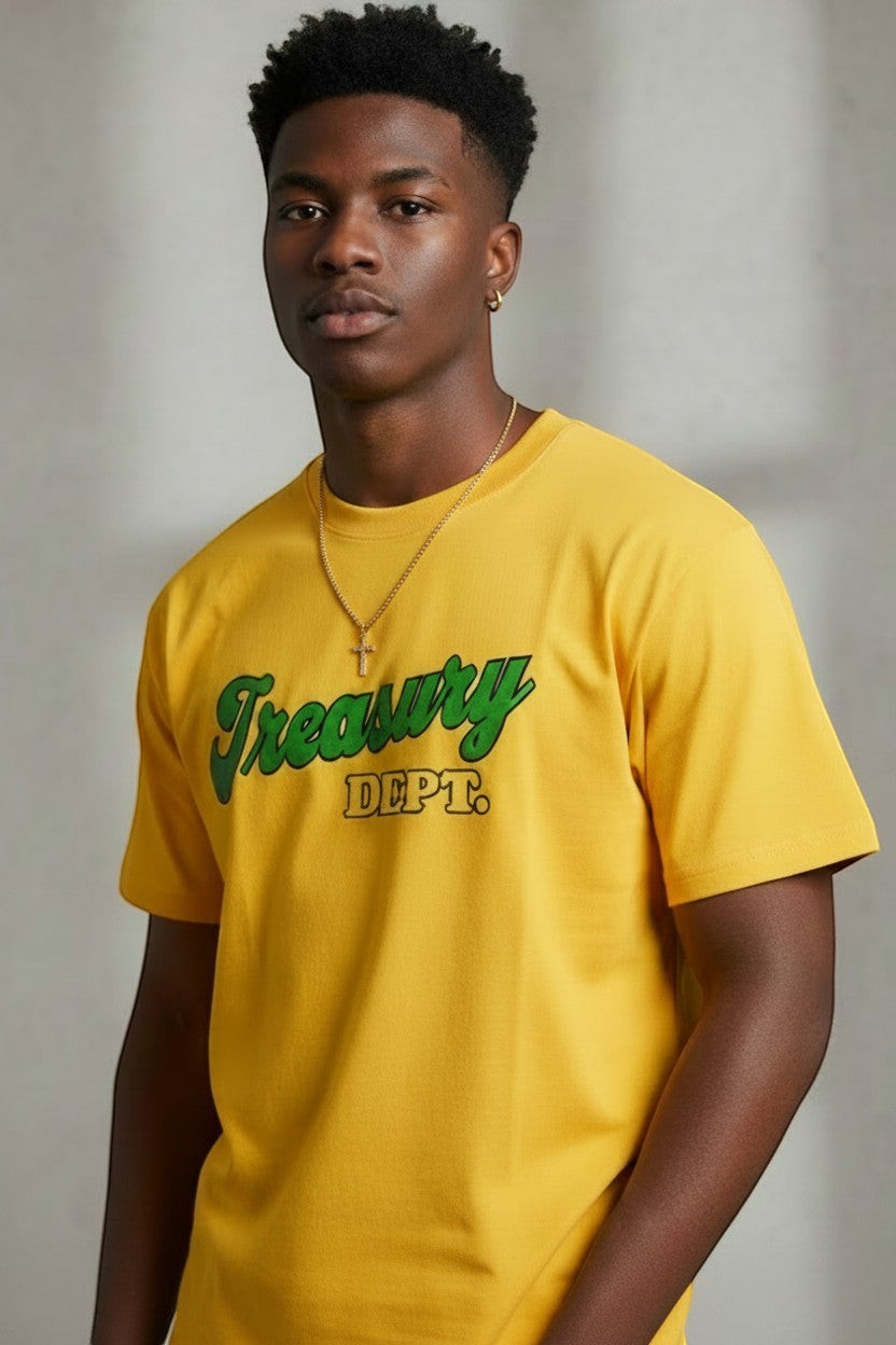 NUMMI VESTES yellow crewneck t-shirt with green Treasury Dept graphic print worn by a young man